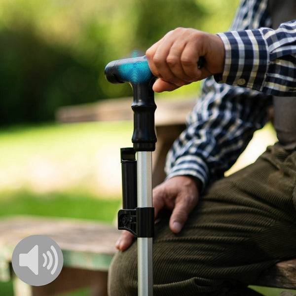 Activarea alarmei sonore de 80 dB pe bastonul extensibil Hannde Inovamarket pentru siguranță suplimentară